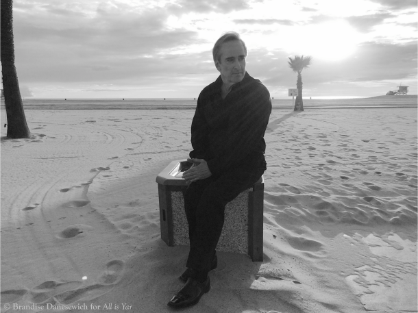 James Conlon sitting down at Santa Monica beach 2